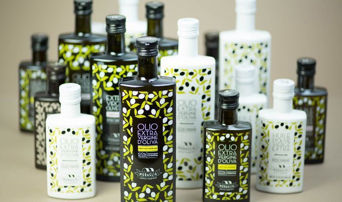 diseño de envases en botellas de vidrio de aceite de oliva