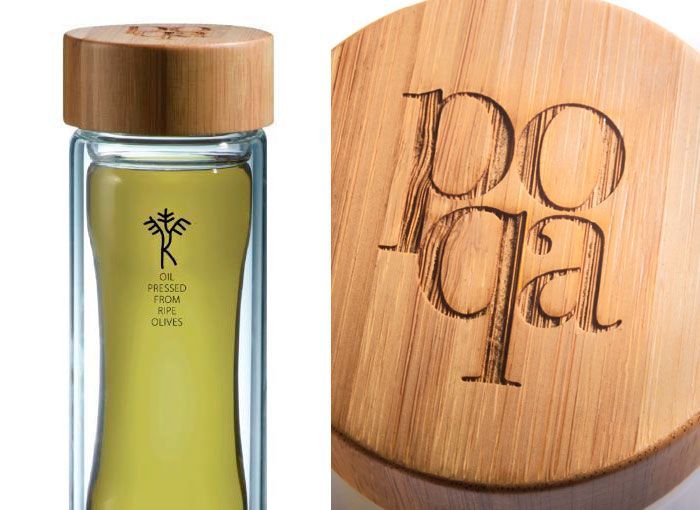 bote de diseño de aceite de oliva con tapón grabado de madera